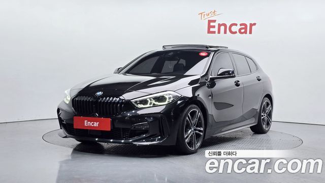 BMW 1-Series 2023 — photo 1