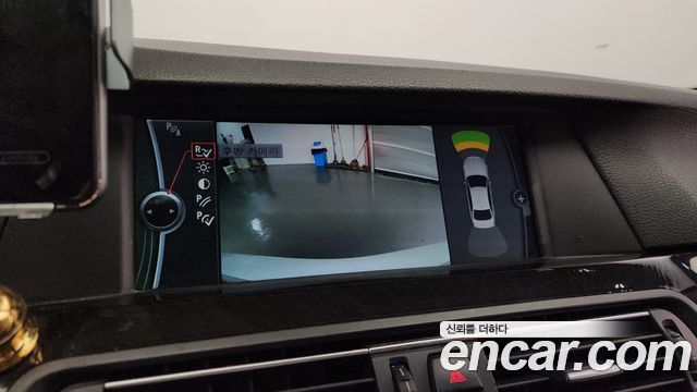 BMW 5-Series 2012 — photo 17