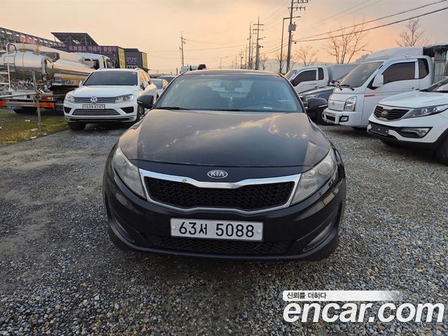 Kia K5 2011 — photo 1
