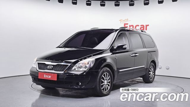 Kia Canival 2012 — photo 1