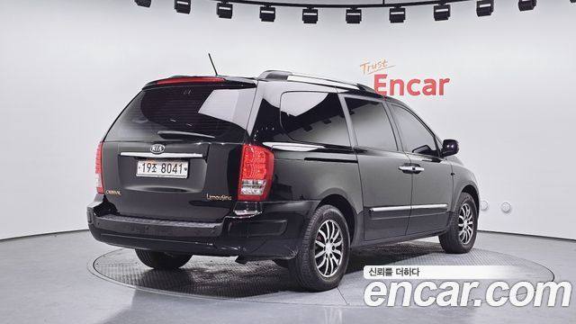 Kia Canival 2012 — photo 2