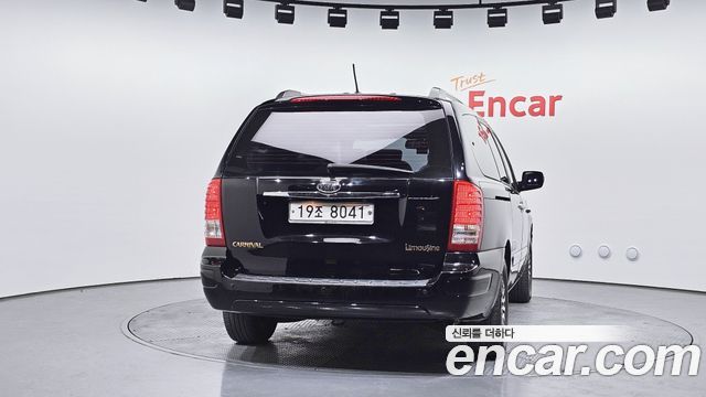 Kia Canival 2012 — photo 4
