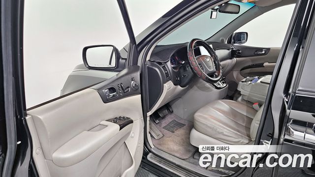 Kia Canival 2012 — photo 10