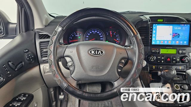 Kia Canival 2012 — photo 16