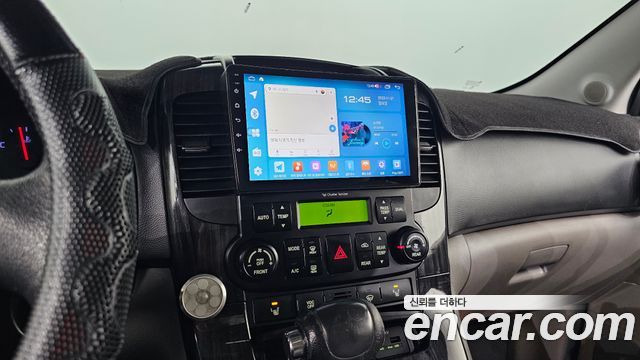 Kia Canival 2012 — photo 17