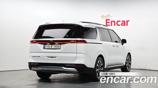 Kia Canival 2021 — photo 2