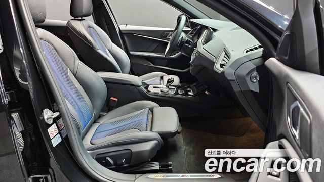 BMW 1-Series 2024 — photo 11