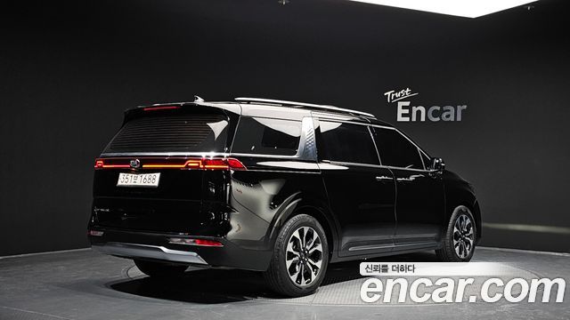 Kia Canival 2021 — photo 2