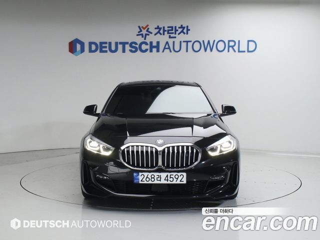 BMW 1-Series 2023 — photo 1