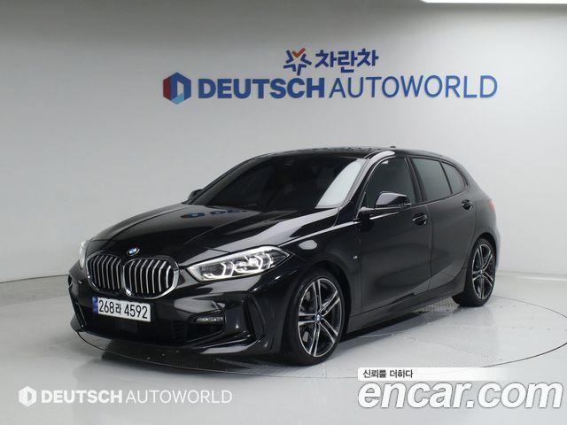 BMW 1-Series 2023 — photo 2