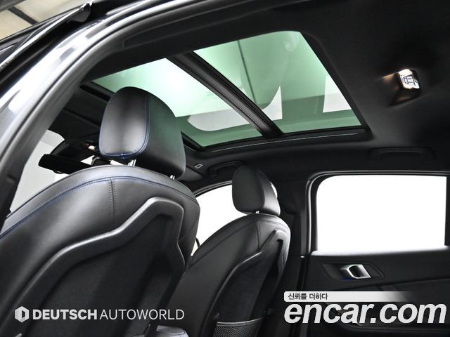BMW 1-Series 2023 — photo 5