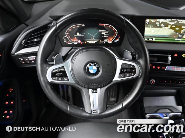 BMW 1-Series 2023 — photo 13