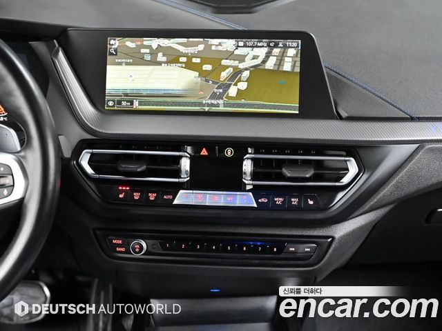 BMW 1-Series 2023 — photo 14