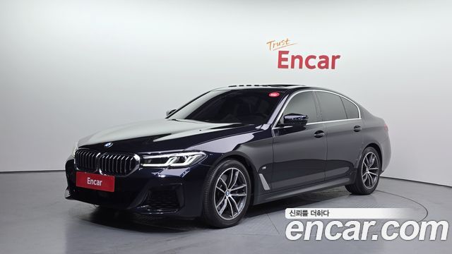 BMW 5-Series 2022 — photo 1