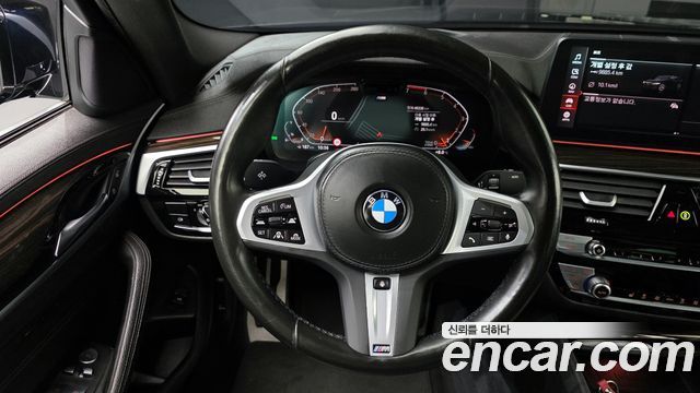 BMW 5-Series 2022 — photo 14