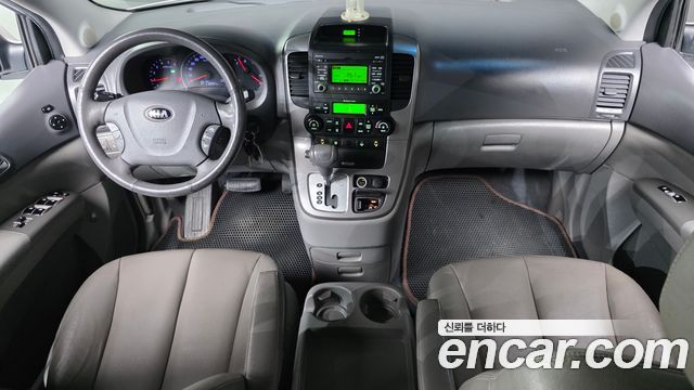 Kia Canival 2013 — photo 7
