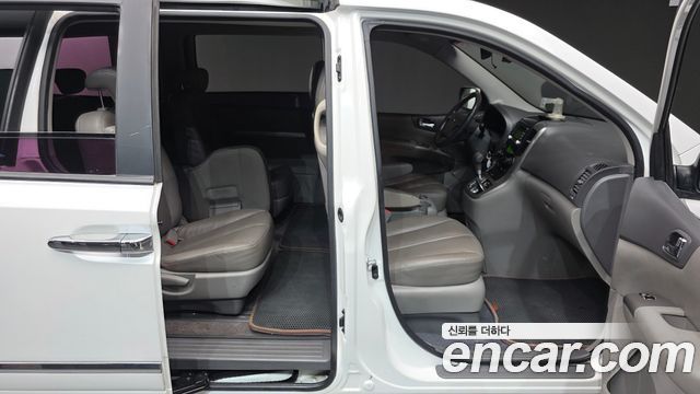 Kia Canival 2013 — photo 10