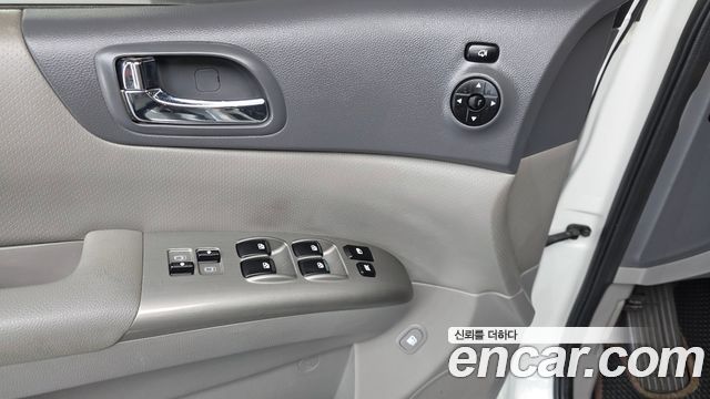 Kia Canival 2013 — photo 12
