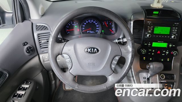 Kia Canival 2013 — photo 14