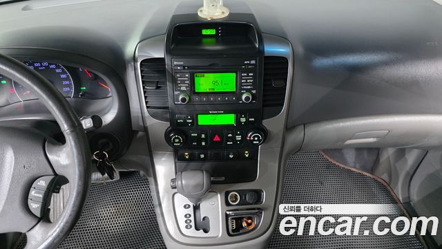 Kia Canival 2013 — photo 15