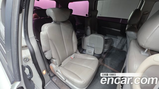 Kia Canival 2013 — photo 19