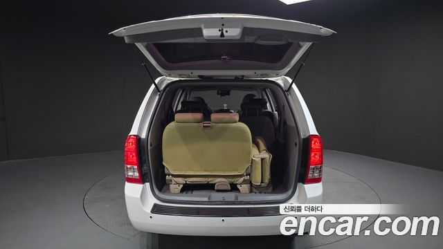 Kia Canival 2013 — photo 20