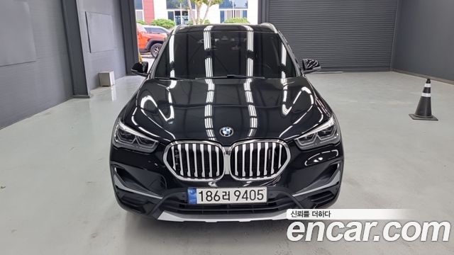 BMW X1 2021 — photo 1