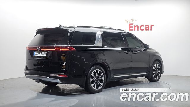 Kia Canival 2021 — photo 2