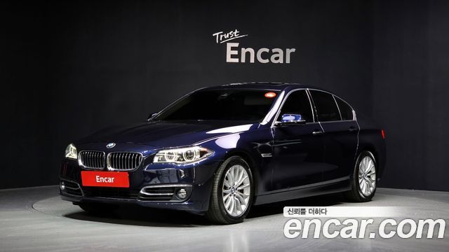BMW 5-Series 2014 — photo 1