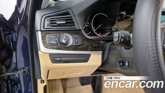 BMW 5-Series 2014 — photo 16