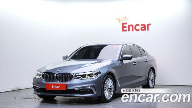 BMW 5-Series 2018 — photo 1