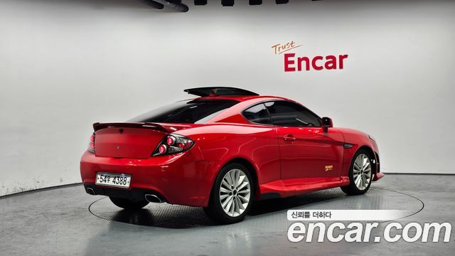 Hyundai Tuscani 2009 — photo 2