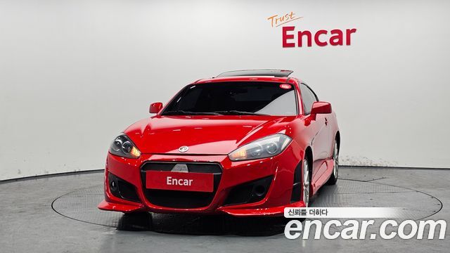 Hyundai Tuscani 2009 — photo 3