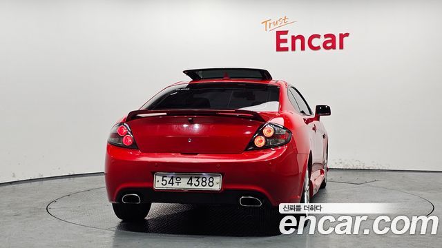Hyundai Tuscani 2009 — photo 4