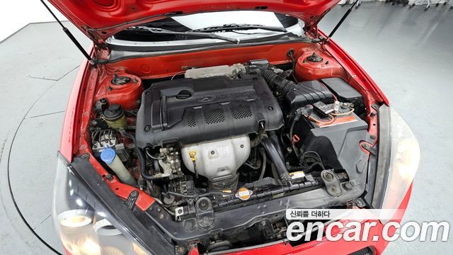 Hyundai Tuscani 2009 — photo 6