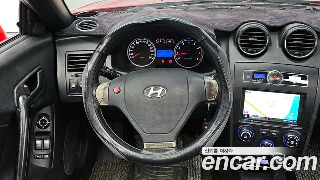 Hyundai Tuscani 2009 — photo 15