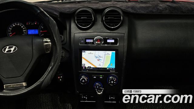 Hyundai Tuscani 2009 — photo 16