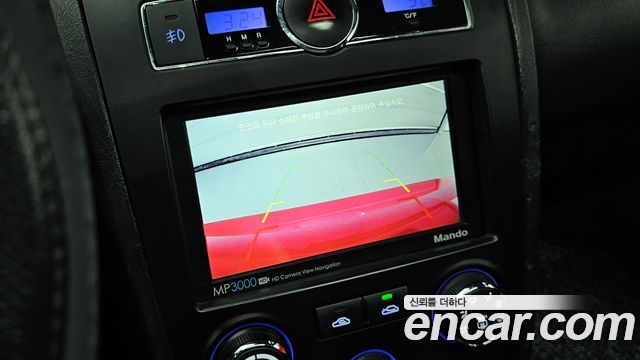 Hyundai Tuscani 2009 — photo 17