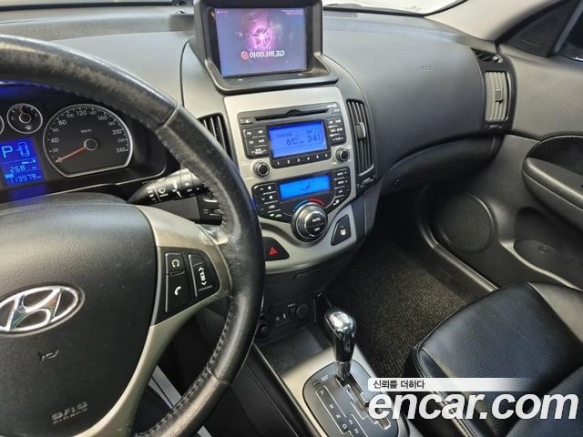 Hyundai i30 2009 — photo 10