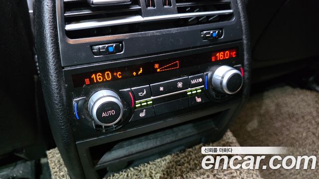 BMW 7-Series 2012 — photo 18