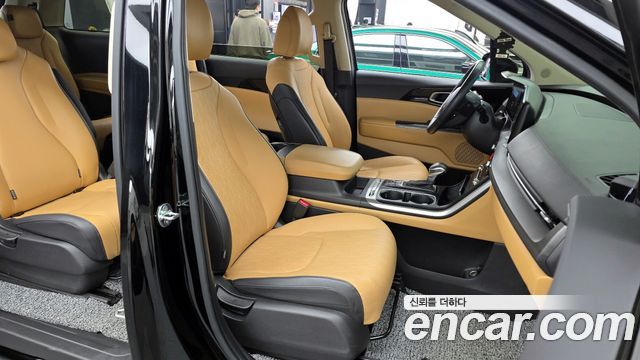 Kia Canival 2023 — photo 11