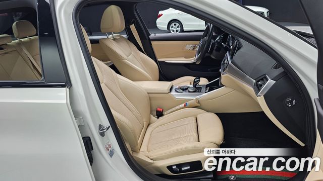 BMW 3-Series 2022 — photo 16