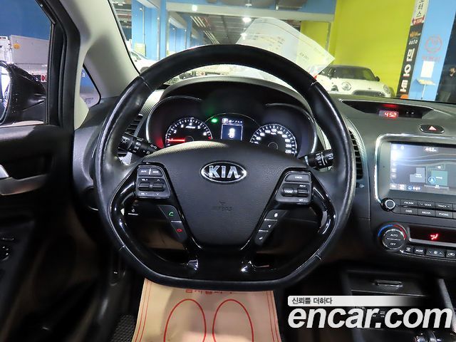 Kia K3 2016 — photo 10