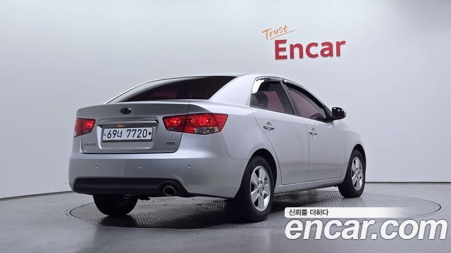 Kia Porte 2013 — photo 2