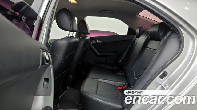 Kia Porte 2013 — photo 13