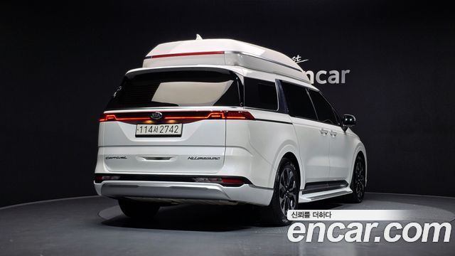 Kia Canival 2021 — photo 2