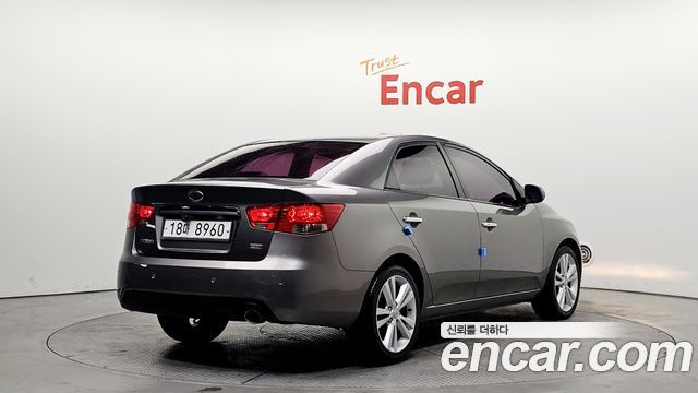 Kia Porte 2011 — photo 2