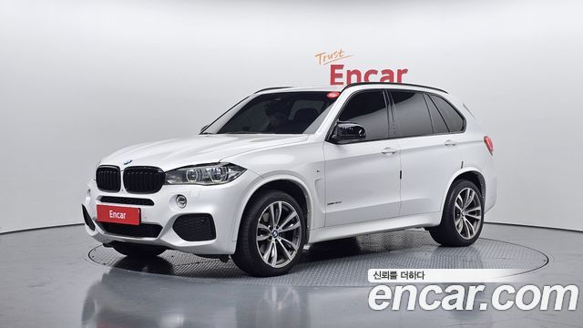 BMW X5 2015 — photo 1