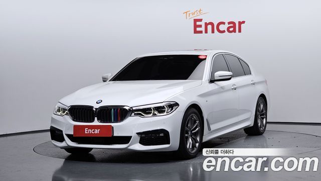 BMW 5-Series 2018 — photo 1