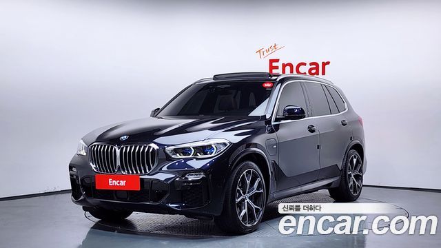 BMW X5 2021 — photo 1